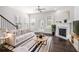 Bright living room with a fireplace, hardwood floors, and modern decor at 2026 Manchester Ne St, Atlanta, GA 30324