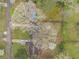 Bird's eye view of a landscaped yard featuring a fire pit, patio, and mature trees at 2999 San Juan Dr, Decatur, GA 30032