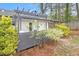 The rear patio boasts a pergola, creating a cozy and stylish outdoor retreat at 2999 San Juan Dr, Decatur, GA 30032