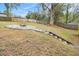 The backyard includes a wooden staircase leading to the backyard firepit at 2999 San Juan Dr, Decatur, GA 30032