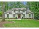 Beautiful two-story home featuring a manicured lawn and a classic architectural design at 3776 N Stratford Ne Rd, Atlanta, GA 30342
