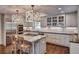 Spacious kitchen featuring granite countertops, an island cooktop, and stainless steel appliances at 3776 N Stratford Ne Rd, Atlanta, GA 30342