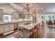 Open-concept kitchen with an island cooktop, and dining area at 3776 N Stratford Ne Rd, Atlanta, GA 30342