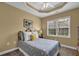 Bedroom with soft lighting and a window at 241 Orchards Cir, Woodstock, GA 30188
