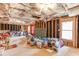 Unfinished basement with exposed insulation, potential for customization and additional living space at 3743 Southland Dr, Buford, GA 30519