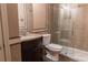 Bathroom featuring wood floors and a shower with a glass enclosure at 703 Paul Revere Dr, Locust Grove, GA 30248