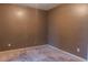 Simple carpeted bedroom featuring neutral colors and natural light, offering a relaxing and comfortable space at 703 Paul Revere Dr, Locust Grove, GA 30248