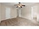 Bedroom featuring ceiling fan, and access to adjacent areas at 1196 Oak Sw Rd, Lilburn, GA 30047