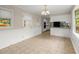 Breakfast area with natural light, leading to the kitchen and outdoor access at 1196 Oak Sw Rd, Lilburn, GA 30047