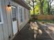 Exterior view of a backyard deck and fenced yard at 3260 Rivermist Cv, Decatur, GA 30034