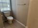 Full bathroom with commode and window for light at 3260 Rivermist Cv, Decatur, GA 30034
