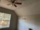 Bedroom with ceiling fan and window with blinds at 3260 Rivermist Cv, Decatur, GA 30034