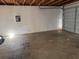 Spacious garage area with overhead lighting and ample room for parking at 3260 Rivermist Cv, Decatur, GA 30034
