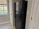 A refrigerator sits beside the door in a kitchen at 3260 Rivermist Cv, Decatur, GA 30034