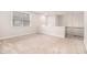 Expansive bonus room with neutral carpeting and a view of the lower level at 345 Caledonia Ct, Peachtree City, GA 30269