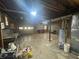 Unfinished basement with concrete walls, exposed beams, and ample space for storage or customization at 5834 Heardsville Rd, Cumming, GA 30028