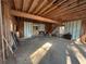Unfinished garage space with exposed wood beams, offering potential for customization at 5834 Heardsville Rd, Cumming, GA 30028