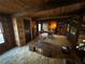 Spacious home office with wood-paneled walls, built-in bookshelves, and plenty of natural light at 5834 Heardsville Rd, Cumming, GA 30028
