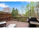 Enjoy outdoor living on this spacious deck with a grill and beautiful wooded views at 611 Vinings Estates Se Dr, Smyrna, GA 30126