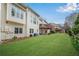 Back exterior of townhome with a large backyard and a patio at 611 Vinings Estates Se Dr, Smyrna, GA 30126