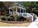 Picturesque gazebo surrounded by lush greenery and landscaping at 611 Vinings Estates Se Dr, Smyrna, GA 30126