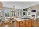 Stylish kitchen with center island, stainless steel appliances, open to the living room and dining area at 611 Vinings Estates Se Dr, Smyrna, GA 30126