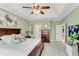 Lovely main bedroom showing ensuite bathroom, flat screen tv and a king size bed at 611 Vinings Estates Se Dr, Smyrna, GA 30126