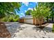 Side view of a brick home with a large driveway leading to a two-car garage at 1840 Linwood Ave, Atlanta, GA 30344