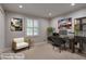 Bright home office features a modern desk, comfortable chair, and decorative artwork at 1840 Linwood Ave, Atlanta, GA 30344