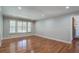 Bright, open living area with hardwood flooring, neutral walls, and ample natural light at 1840 Linwood Ave, Atlanta, GA 30344