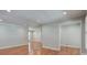 Expansive living room with hardwood floors and neutral paint, leading to other rooms at 1840 Linwood Ave, Atlanta, GA 30344