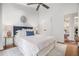 Bright bedroom featuring vaulted ceiling, fan, and stylish decor at 2568 Sugarplum Ne Ct, Atlanta, GA 30345