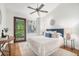 Bright bedroom with vaulted ceiling, ceiling fan, and serene decor at 2568 Sugarplum Ne Ct, Atlanta, GA 30345