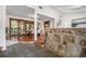 Entryway featuring slate floors and stone accents flowing into dining area at 2568 Sugarplum Ne Ct, Atlanta, GA 30345
