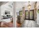Inviting foyer boasts stone accents, slate tile, and views into living spaces at 2568 Sugarplum Ne Ct, Atlanta, GA 30345