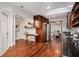 Stylish kitchen with wood cabinetry, stone countertops, and adjoining dining area at 2568 Sugarplum Ne Ct, Atlanta, GA 30345