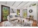 Inviting living room with hardwood floors, comfortable seating, natural lighting, and decor at 2568 Sugarplum Ne Ct, Atlanta, GA 30345