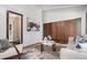 Inviting living room with plush seating, stylish rug, and wood-framed doorway at 2568 Sugarplum Ne Ct, Atlanta, GA 30345
