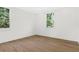 Bright bedroom with hardwood floors and windows offering natural light at 52 25Th Nw St, Atlanta, GA 30309