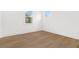 Bright bedroom with hardwood floors and windows offering natural light at 52 25Th Nw St, Atlanta, GA 30309