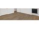 Bedroom featuring hardwood floors and access to the bathroom at 52 25Th Nw St, Atlanta, GA 30309