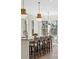 Kitchen featuring island with barstool seating, bronze hardware and fixtures, and natural lighting at 52 25Th Nw St, Atlanta, GA 30309