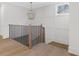 Bright landing area showcasing decorative millwork, wood floors, and a stylish pendant light fixture at 52 25Th Nw St, Atlanta, GA 30309