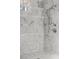 Modern marble-tiled shower with dual shower heads and a window for natural light at 52 25Th Nw St, Atlanta, GA 30309