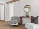 Comfortable sitting area boasts wood floors, natural light, and stylish decor for a modern, relaxing space at 52 25Th Nw St, Atlanta, GA 30309