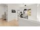 Hallway with a modern railing and view of the neighborhood at 10940 Serenbe Ln, Chattahoochee Hills, GA 30268