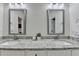 Bathroom with double vanity, granite countertop and modern faucets at 2225 Nena Way, Tucker, GA 30084
