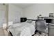 Bright bedroom features a desk space, neutral carpet, and ample natural light streaming through window blinds at 2225 Nena Way, Tucker, GA 30084