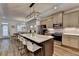 Open concept kitchen with large island, seating, and stainless steel appliances at 2225 Nena Way, Tucker, GA 30084