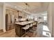 Open concept kitchen with stainless steel appliances and island with seating at 2225 Nena Way, Tucker, GA 30084